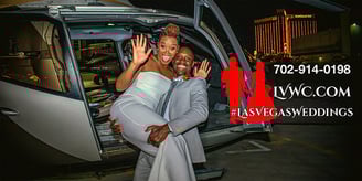 wedding couple taking photos by a helicopter