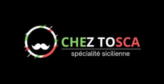 a chef in a black shirt and a chef hat