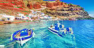 Santorini: Iconic white-washed buildings, blue domes, and unforgettable sunsets