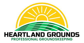 a logo for heartland grounds professional groundskeeping lawn care and snow removal service