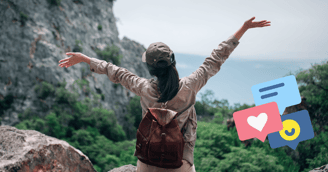a woman with a backpack on a mountain