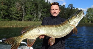 fishing escape sweden pike fishing in sweden. like this fisherman, pike fishing in sweden.