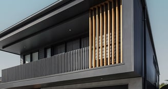 a modern house with a large garage door and a garage door