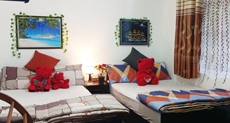 Nuwara Eliya accommodation family room at Nobel Bungalow with double beds and cozy decor