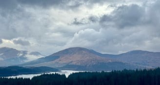 Beautiful peaceful moody scene of hills and river