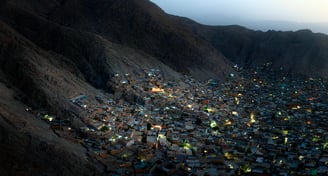 a cityscape of a mountain with a view of a city