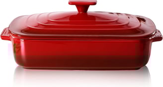 a red casserole dish with a red lid