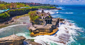 a beach with a view of a beach and a cliff
