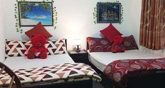 Double beds at Nobel Bungalow Nuwara Eliya – comfortable family room setup