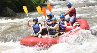 a group of people on raft raft rafting down a river