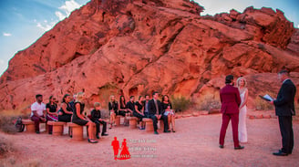 a man and woman getting married in a desert