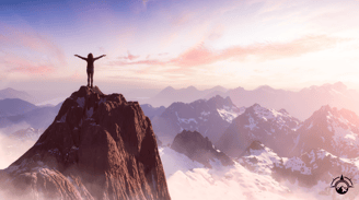a person standing on top of a mountain