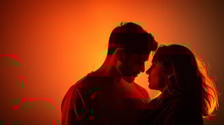 a man and woman in silhouettes in a red light