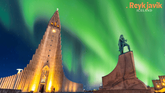 a statue of a man on a pedestal with a green light