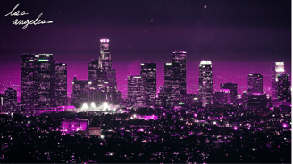 a city skyline with a purple sky