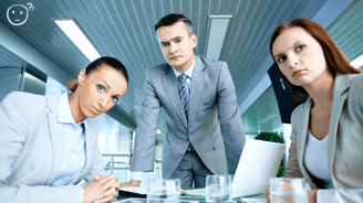 a group of business people looking with misunderstanding