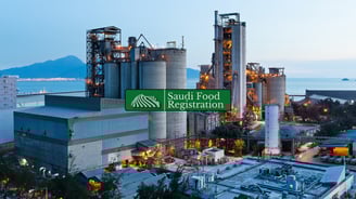 Saudi Food Registration Logo with food manufacturing facility in background