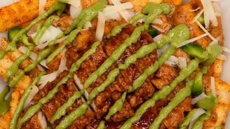 creamy cajun loaded fries with basil aioli
