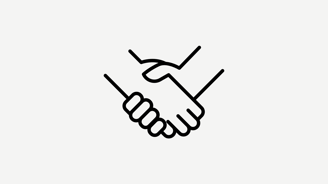 A handshake in front of a white background