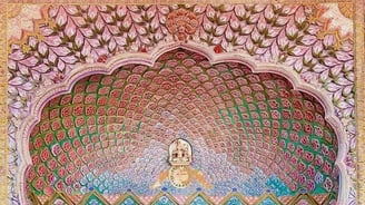 a door to a building with a golden door in the city palace of jaipur in India