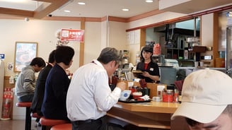 Working class lunch dining in Nakau restaurant