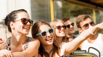 a group of people sitting on a bus