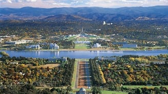 a view of the canberra city skyline from the air