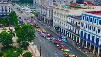 a city street scene with a view of a city