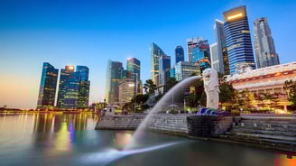 a cityscape of a city with a fountain