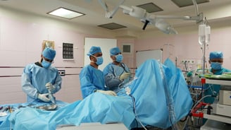 a group of doctors and nurses in a hospital