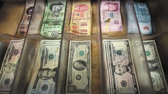 Currency Turmoil: Mexican Peso and Canadian Dollar Under Pressure Amid U.S. Tariff Threats