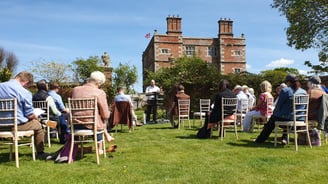 Harry Frost performing Erkenwald in front of Soulton Hall