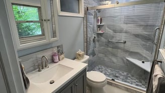 a bathroom with a shower and a shower remodel in South Jersey