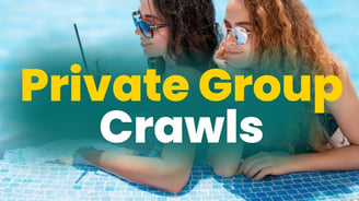 Two women lounging poolside in sunglasses with drinks, representing private group dayclub crawl experiences in Las Vegas.