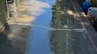 After wet blasting it is ready to be resurfaced and sealed.