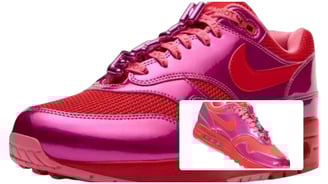 a pair of pink and purple nike air max sneakers