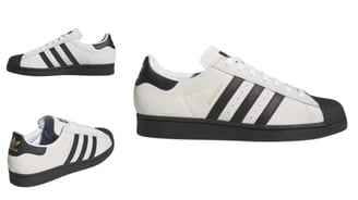 a pair of adidas superstar ADV sneaker, with black sole