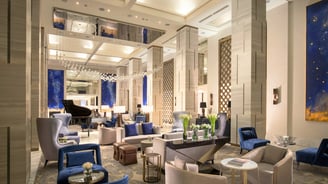 Large-scale mural artwork created by Lumai Studio for grand lobby at St. Regis Astana