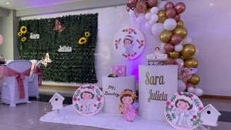 a table with a bunch of balloons and balloons