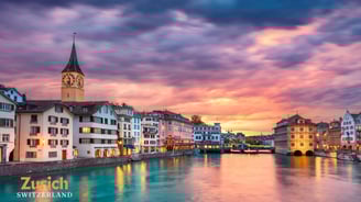 a river with a clock tower in the middle of it