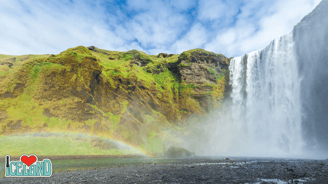 a rainbow colored waterfall in Iceland