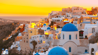 a sunset view of a Santorini, Greece