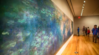 a large painting of a painting of a woman in a blue dress