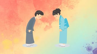 Japanese people bowing to each other