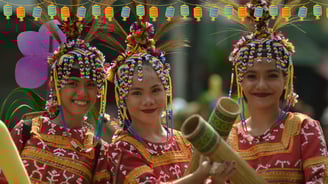 three women in colorful costumes at a local festival