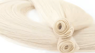 a bunch of hair extensions with a white background