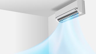 a white air conditioner with a blue light coming out of the air condition