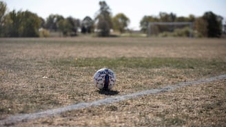 Soccer ball in a college field