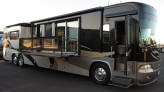 a bus parked in a parking lot with a bus