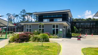 a building with a bench and a bench in front of it